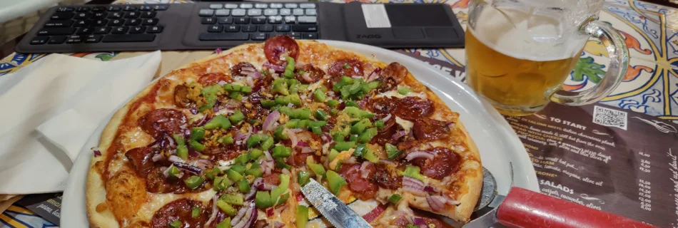 a pizza on a white plate